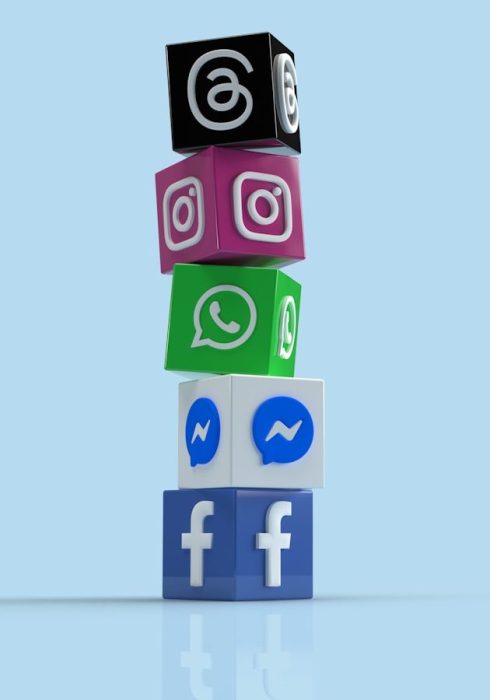a stack of colorful blocks with social icons on them
